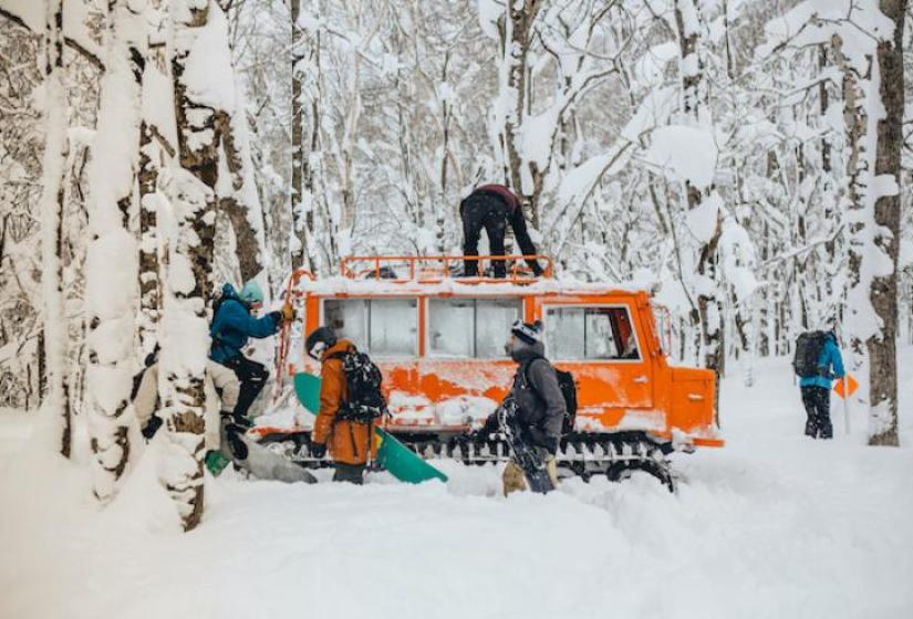 There is incredible cat skiing to be had in Niseko A snow cat in snowy trees
