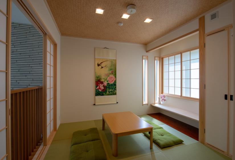 Japanese style tatami room with wall hanging