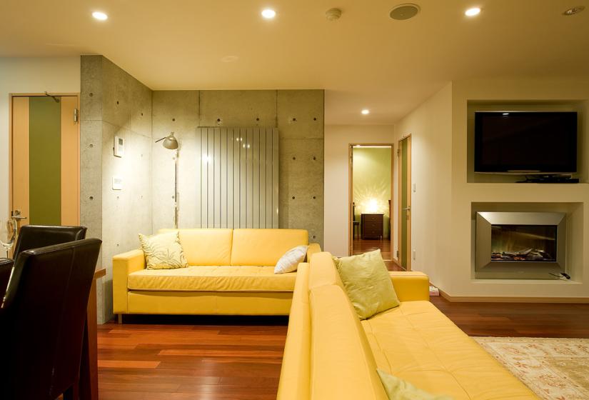 Two yellow sofas in the living area