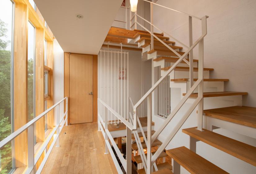 Staircase white walls wooden steps