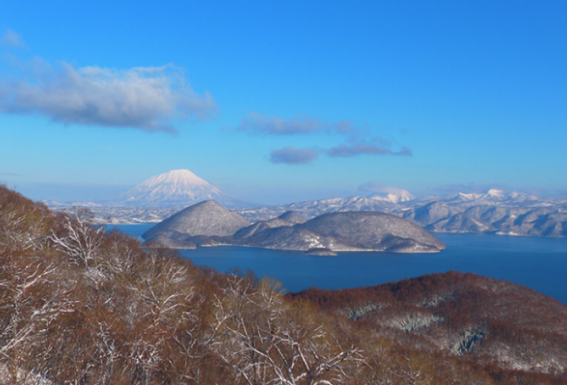 The view accross lake Toya to the volcanic cone of Mount Yotei